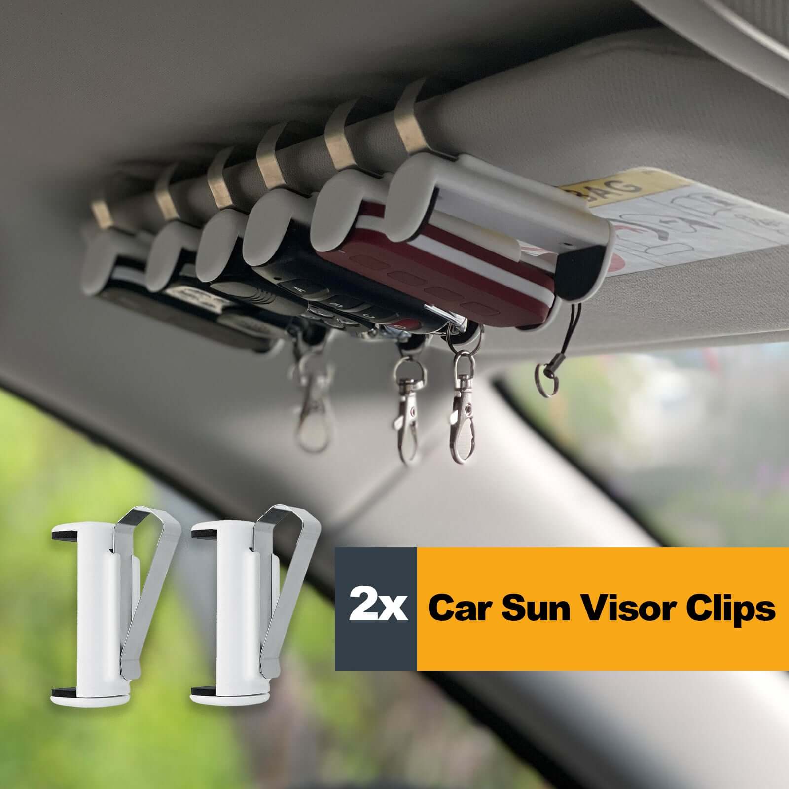Car sun visor clips holding keys securely while driving, showing functionality and convenience of 2x clip set.
