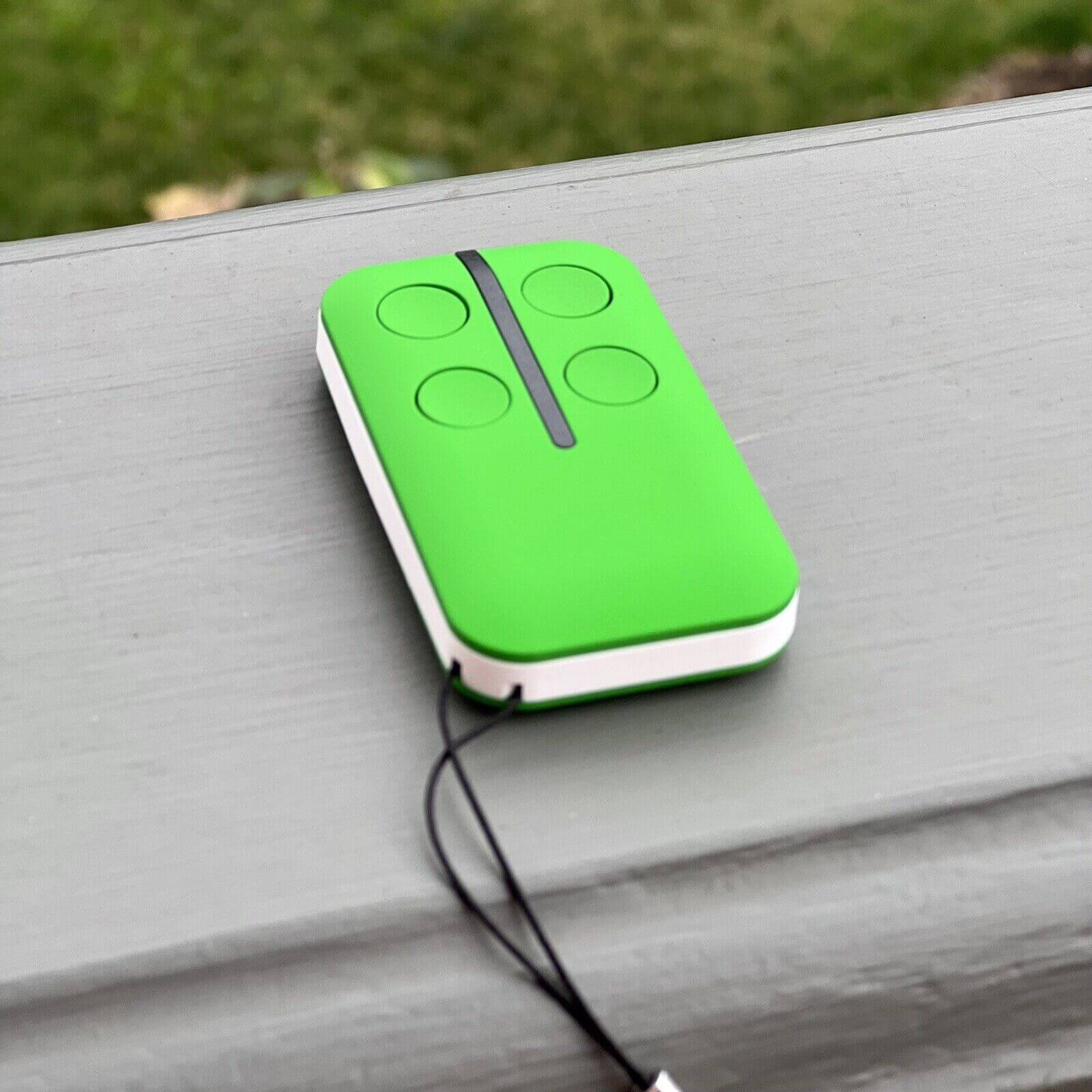 HomEntry HE60/HE60R replacement garage remote in green color with key ring, compatible with HE4331 and HE60ANZ, ideal for Garageway use.