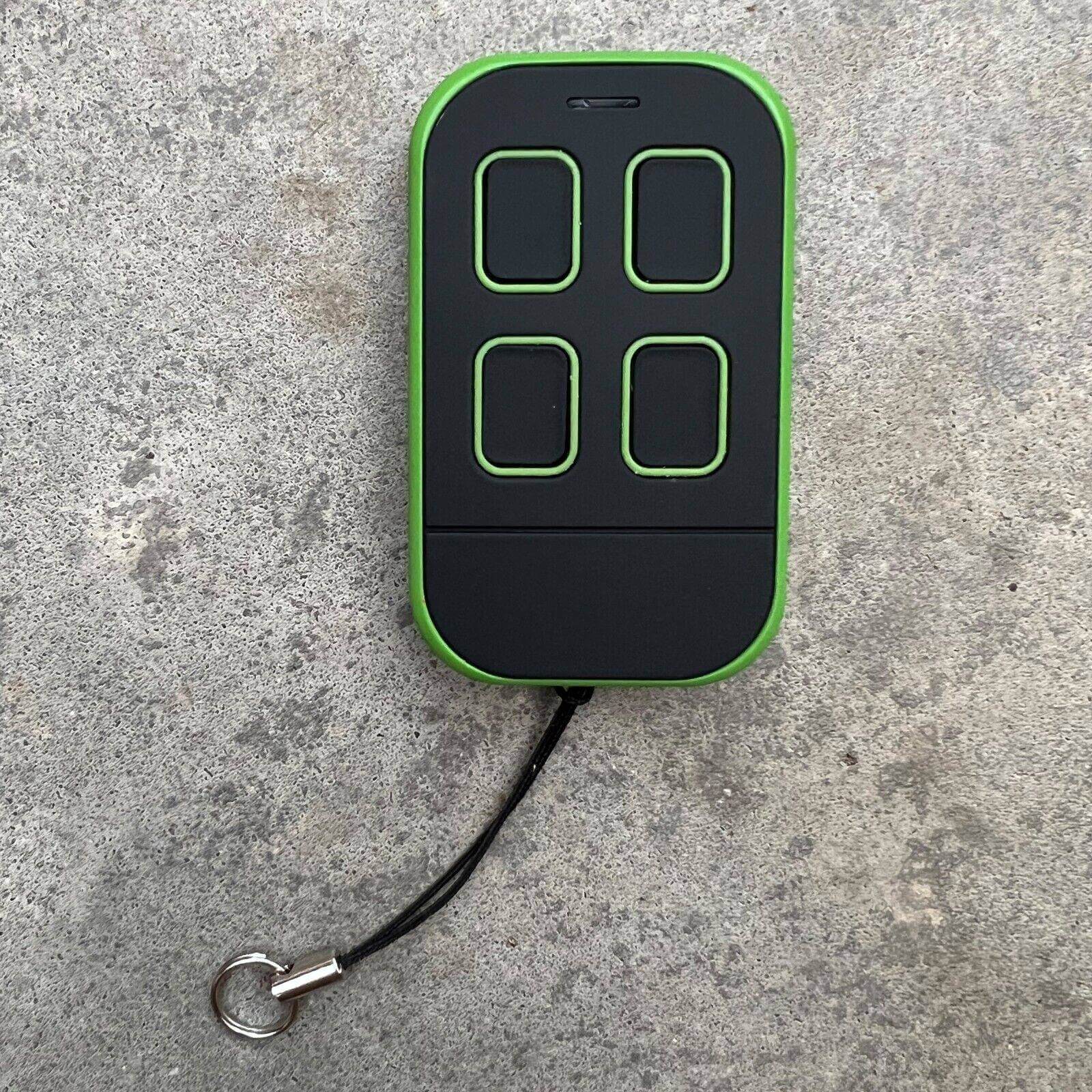 Merlin+ C945 compatible remote control with four buttons, black and green design, ideal for gate and garage openers.