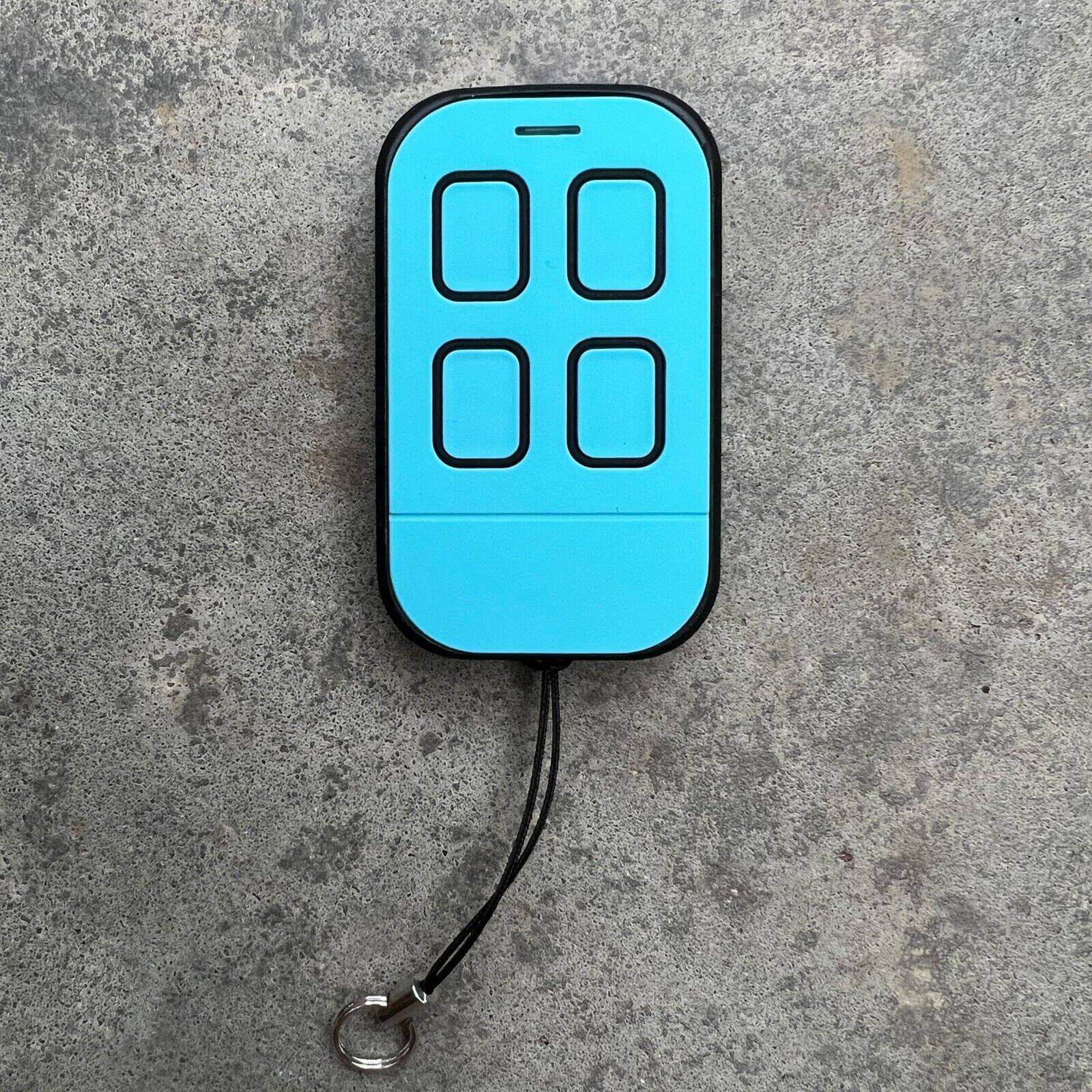 ATA PTX4 compatible remote control in blue, featuring four buttons and a keychain attachment.