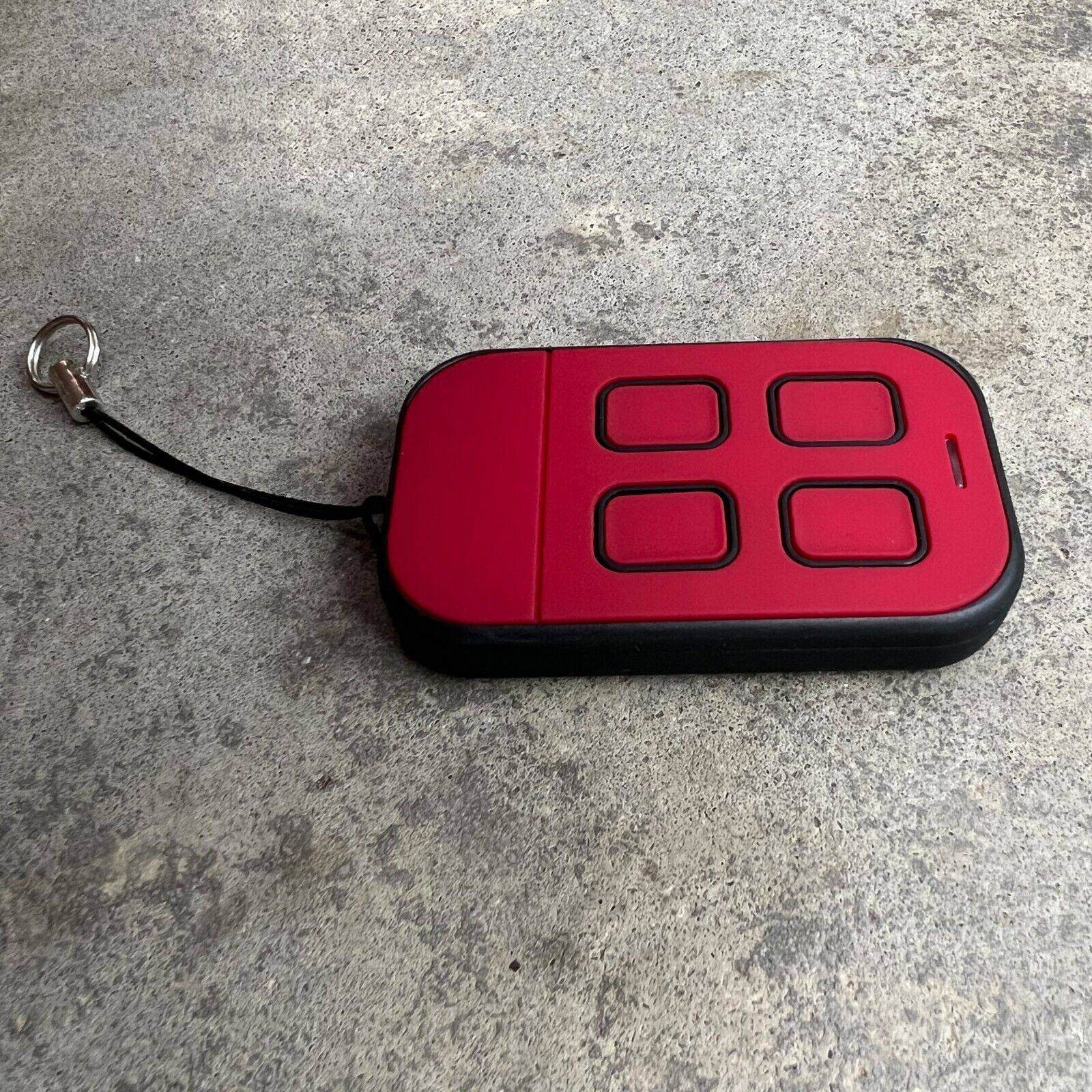 ATA PTX5 v1 TrioCode Replacement Remote with red and black design, featuring four buttons and a keychain loop.