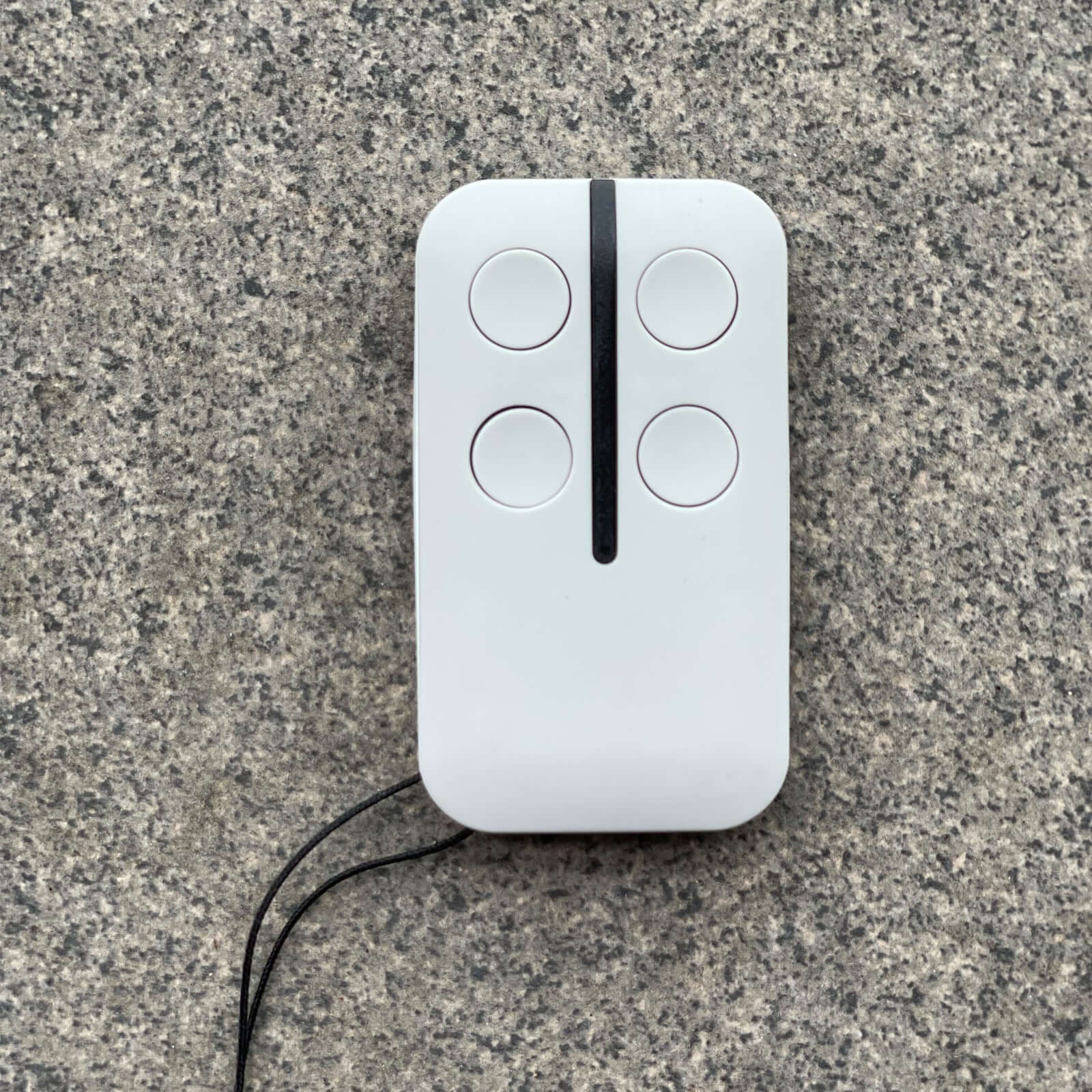 Centsys Centurion NOVA Garage Gate Replacement Remote with four buttons on stone background, compatible with sliding and swing models. Garageway.