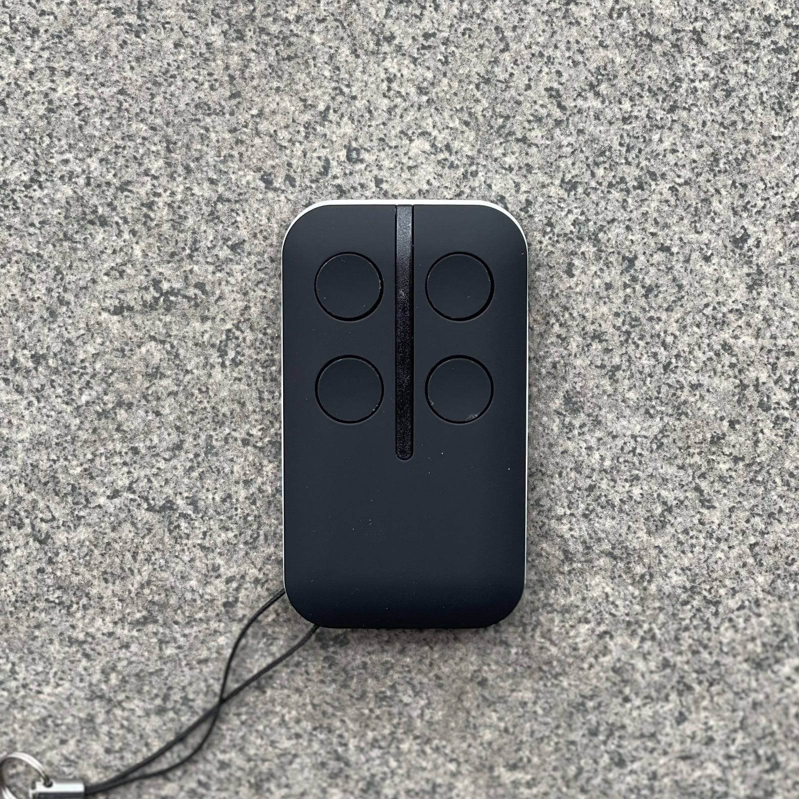 Ditec Compatible Garage/Gate Remote Control with 4-button design, includes keyring and batteries. Compatible with BIXLG4, GOL4 models. Garageway.