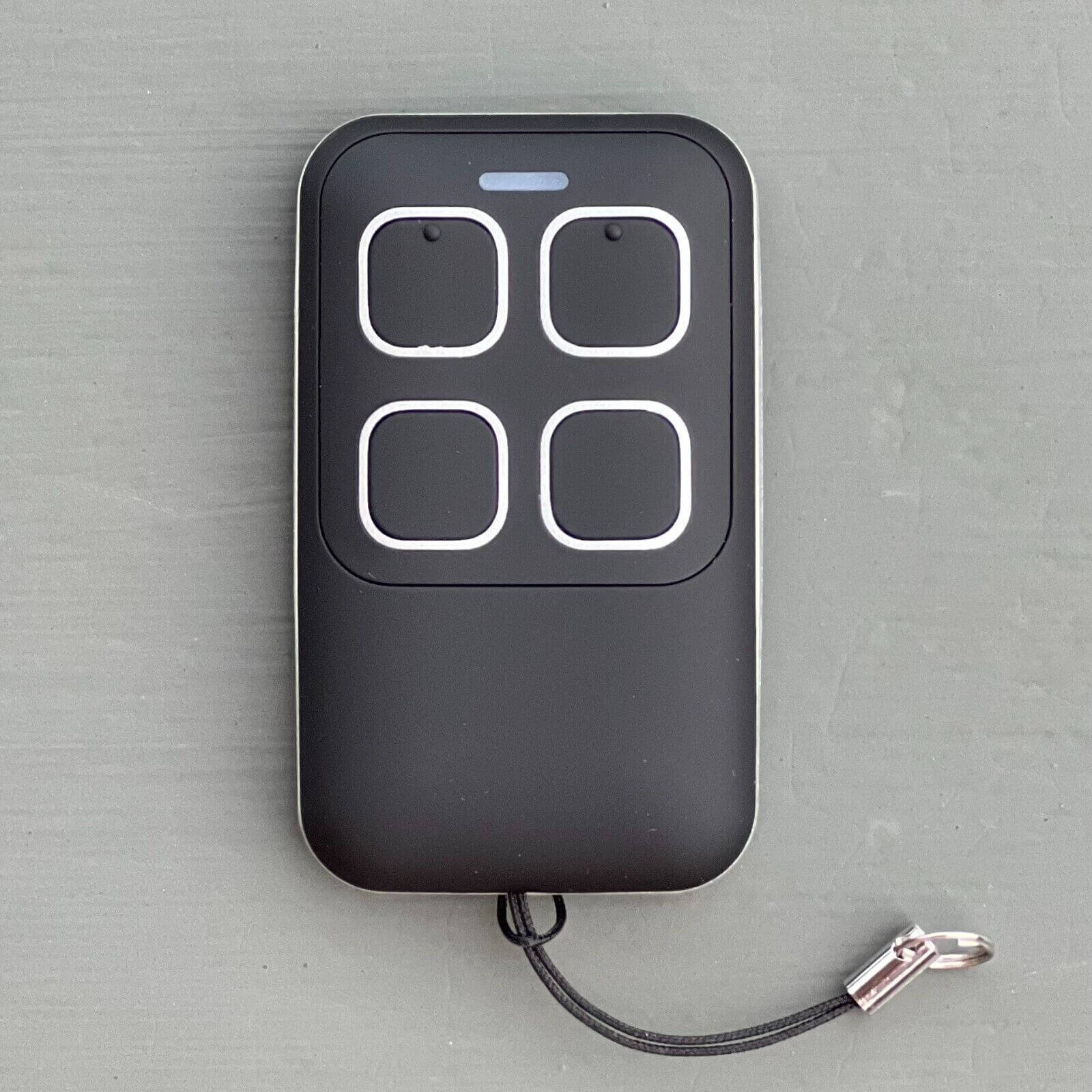 Black Gliderol compatible remote control for Rollamatic GDR II, GTS, etc., includes key ring and battery for Garageway use.