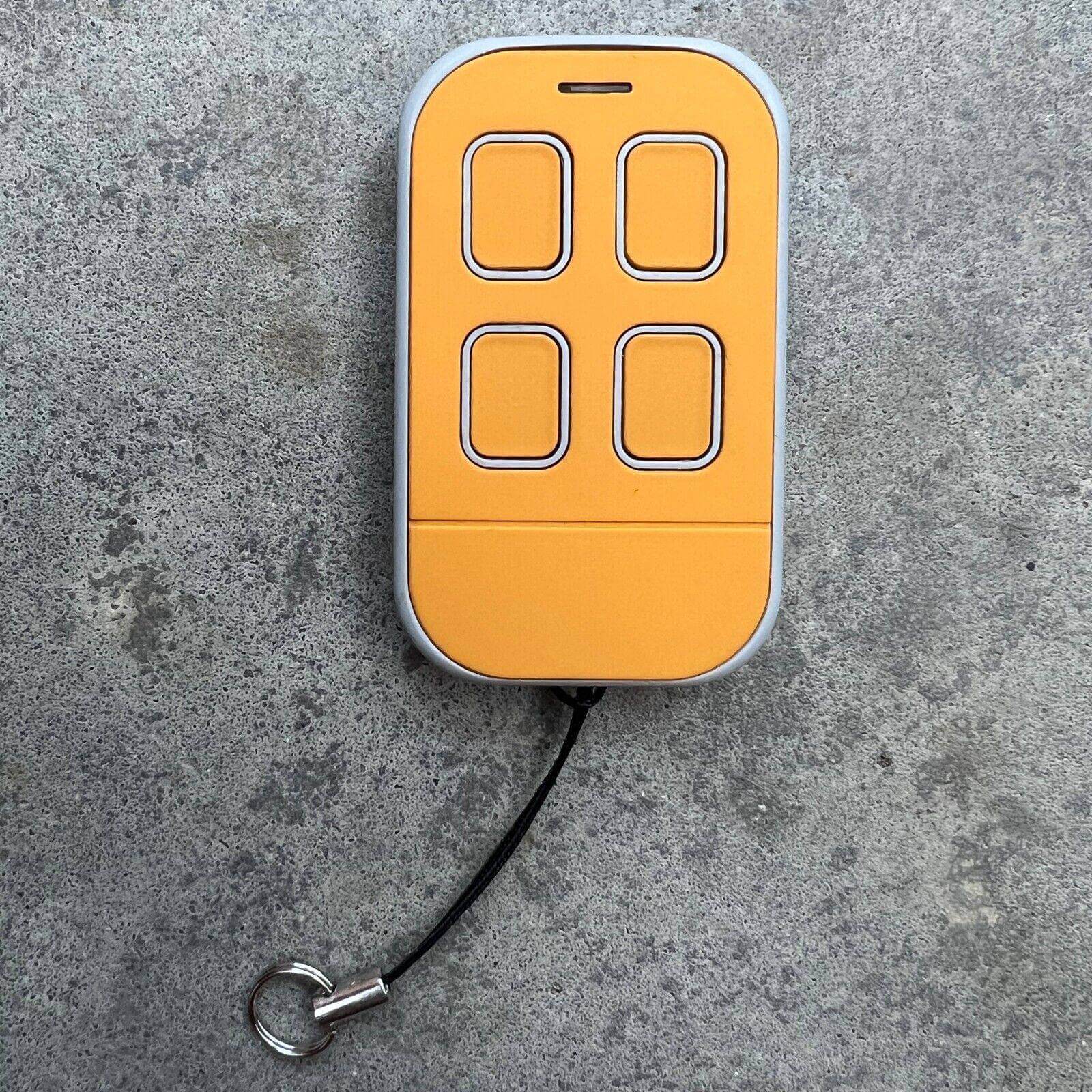 Mhouse compatible remote control in orange color with four buttons and key ring, ideal for GTX4 GTX4C myHouse models.