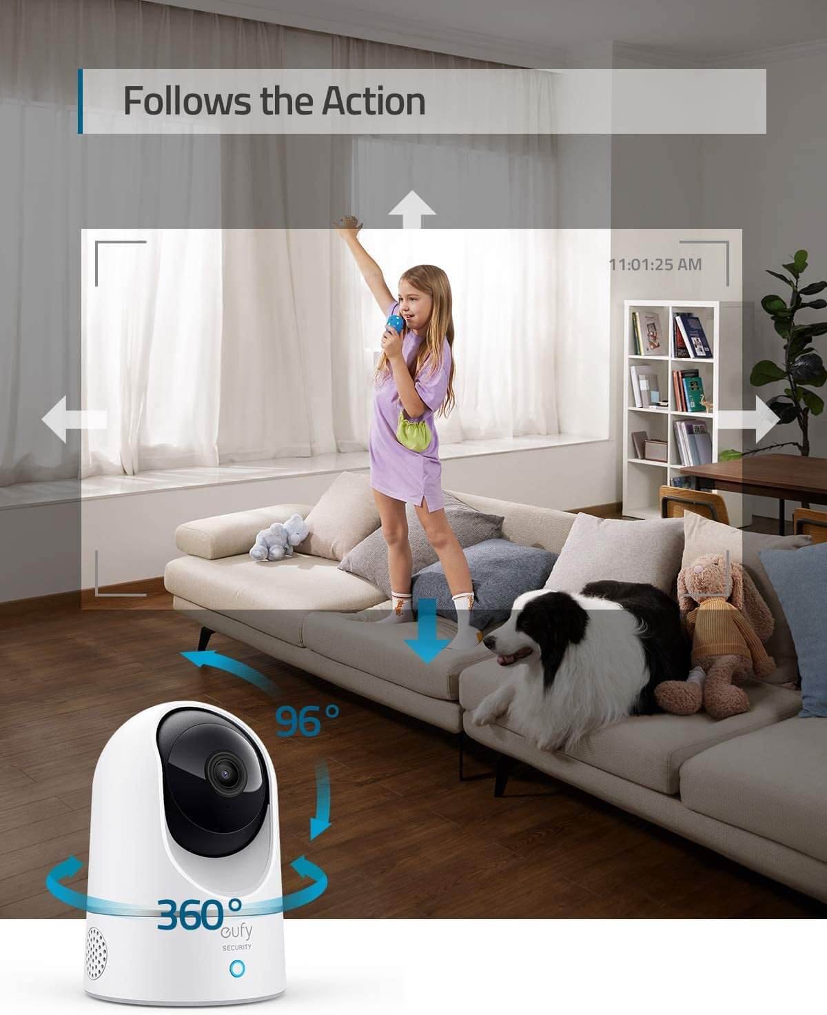 IndoorCam P24 in living room tracking a child and dog, showcasing 360-degree pan and tilt motion tracking.